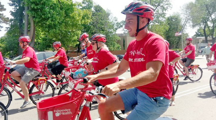 Michael Galligano, CEO of Shared Mobility Inc., the Buffalo-based nonprofit that partnered with Independent Health to bring Reddy bikeshare to Buffalo. Galligano is shown with a group of other bikers during a July 21 press conference at Delaware Park in Buffalo.